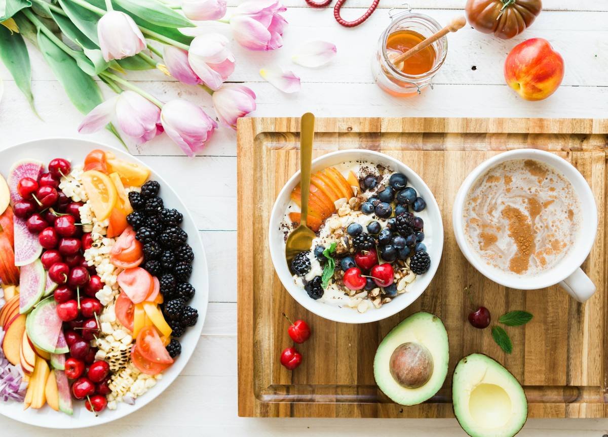 farm fresh territory food why did — basket of local fruits and dairy products on wooden table